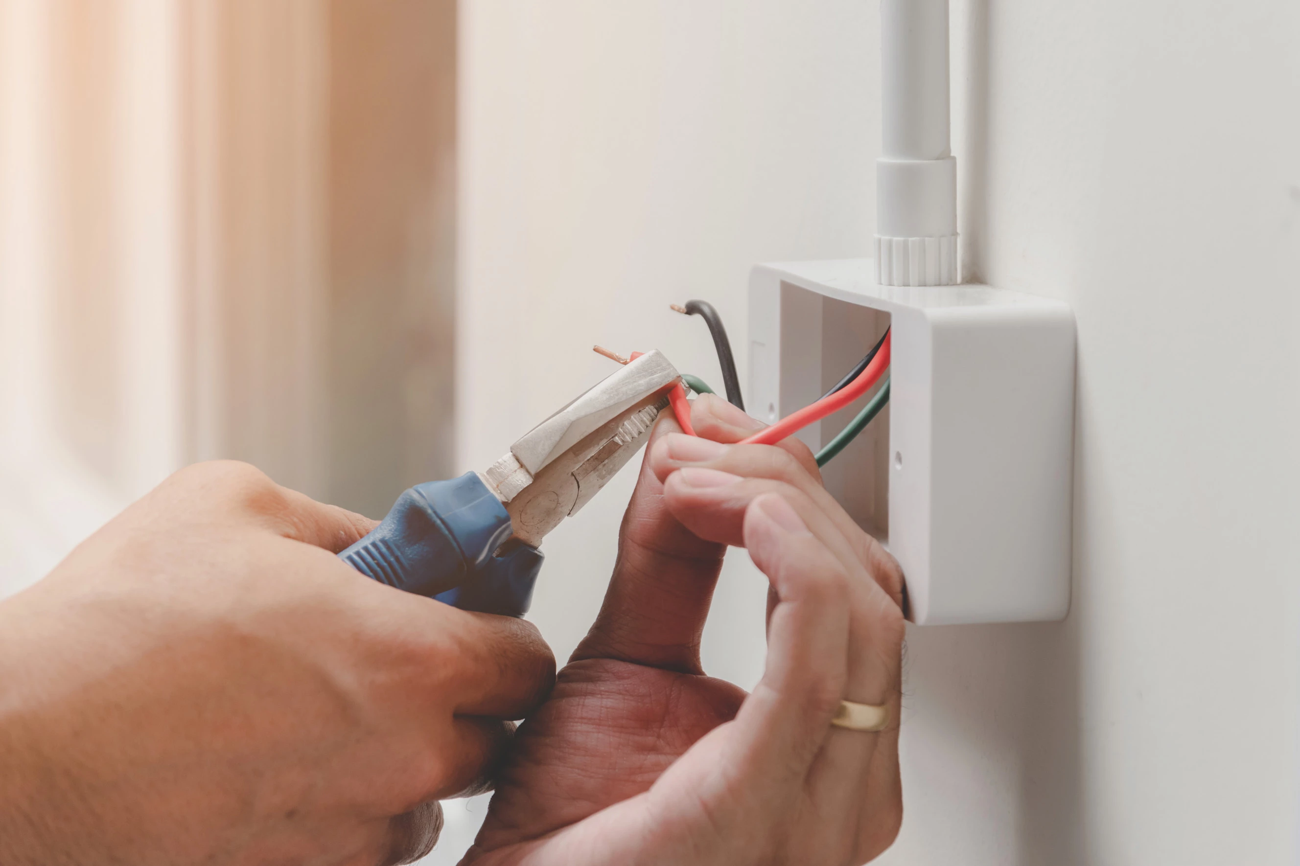 Electrician installing powerpoints